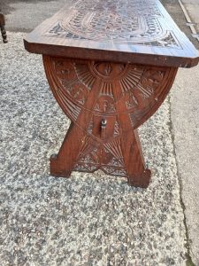 Carved wooden bench