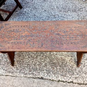 Carved wooden bench